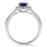 Vue latérale de la bague Saphir des Cieux en platine montrant le halo et les griffes fines.