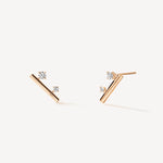 Vue latérale des boucles d’oreilles en or rose Silhouette avec des diamants sertis griffes, montrant la précision du design.